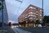 Portland OR Pet-Friendly High Rise - Jute - Brown Property Exterior from Street View, with Nearby Trees, in an Urban Environment