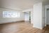 living room with attached kitchen