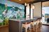 Resident lounge with custom mural and kitchenette on top floor