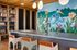 Walden community room with books and games for residents