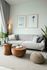living room with grey sofa and decorative grey pillows