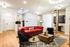 lounge area and fireplace in lobby at fairmount apartments