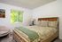 bedroom with large windows