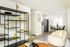 living room with attached kitchen
