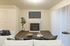 living room with wood like flooring and an electric fireplace at fairview court