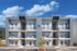 exterior of 3 story Rogers Landing Apartment building