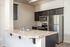 Kitchen at Alderbrook with stainless steel appliances and a breakfast bar