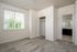 Carpeted bedroom at Alderbrook with en suite bathroom
