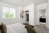 Virtually staged image of bedroom and ensuite bathroom at Alderbrook in Vancouver, WA
