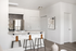Virtually staged kitchen with breakfast bar at Alderbrook apartments in Vancouver, WA