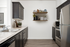 Virtually staged kitchen with stainless steel appliances in Vancouver, WA