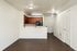 living area with fireplace and sliding glass doors leading to enclosed patio/yard