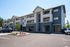 Exterior of Pacific Ridge with parking lot and garage parking available