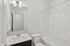 bathroom with bathtub and shower