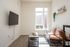 Fully Furnished One-Bedroom, One-Bathroom Floor Plan living area