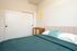 Fully Furnished One-Bedroom, One-Bathroom Floor Plan Bedroom