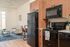Fully Furnished One-Bedroom, One-Bathroom Floor Plan kitchen and living area