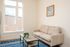 Fully Furnished One-Bedroom, One-Bathroom Floor Plan living area