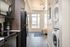 Fully Furnished Studio Floor Plan kitchen and in-home washer + dryer
