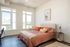 Community Guest Suite bed and living area