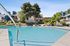 sparkling pool and lounge area