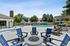 outdoor fire pit with pool and hot tub
