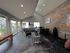 leasing office with waiting area and desk at Silver Creek Apartments
