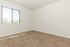 carpeted bedroom with window