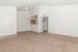 entrance to 2x1 with carpet and breakfast bar