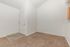 carpeted dining area and entrance