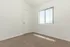 bedroom with carpet and window