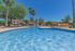 pool with lounge chairs