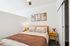 Bedroom with 1/2 wall