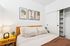 Bedroom with storage closet