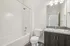 bathroom with shower tub combo