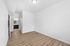 bedroom with ensuite bathroom in background