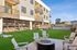 fireplace and cornhole area at asa apartments