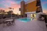 pool and hot tub area with beautiful sunset