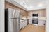 Two bedroom kitchen with stainless steel appliances