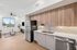 Two bedroom kitchen with stainless steel appliances