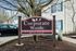 Corporate Woods Apartments wooden sign.