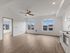 Bright, open living area with ceiling fan at Koz on N. Killingsworth.