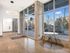 Bright building entrance lobby with floor-to-ceiling glass at Koz on 4th.
