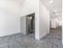 Modern elevator lobby with clean finishes at Koz on 4th apartments.
