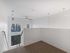 Elevated loft sleeping area overlooking the living space at Koz on 4th.