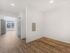 Bright, open apartment interior with modern lighting at Koz on 13th.