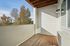 Wooden balcony overlooking trees