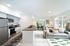 Living space with kitchen, living, and dining area.