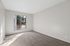 Bedroom with carpet and plastered walls