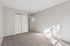 Bedroom with closed closet and carpet